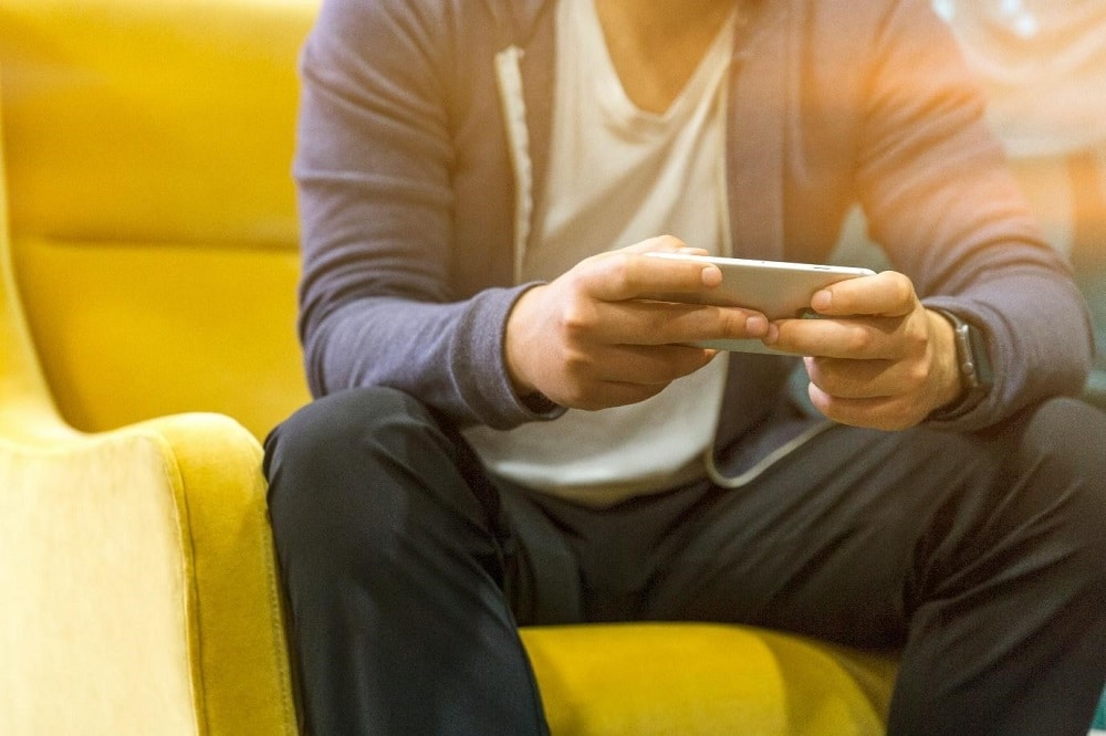 Man sitting with a phone 