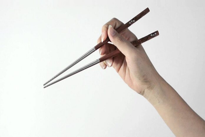 How to Hold Chopsticks