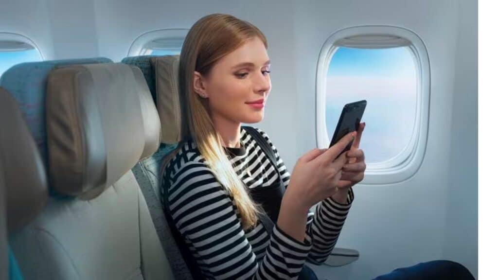 A Woman is Using Emirates WiFi