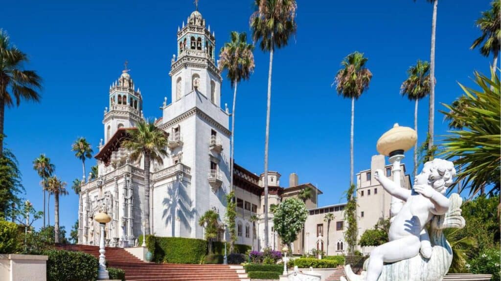 Hearst Castle exterior. Front of the Casa Grande from terrace with sculpture. San Simeon, California.