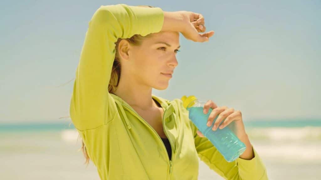 Woman drinking water from a bottle