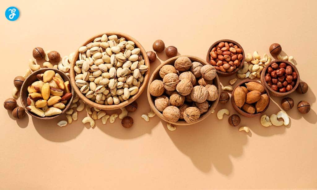 Assorted nuts, including pistachios, walnuts, almonds, and cashews