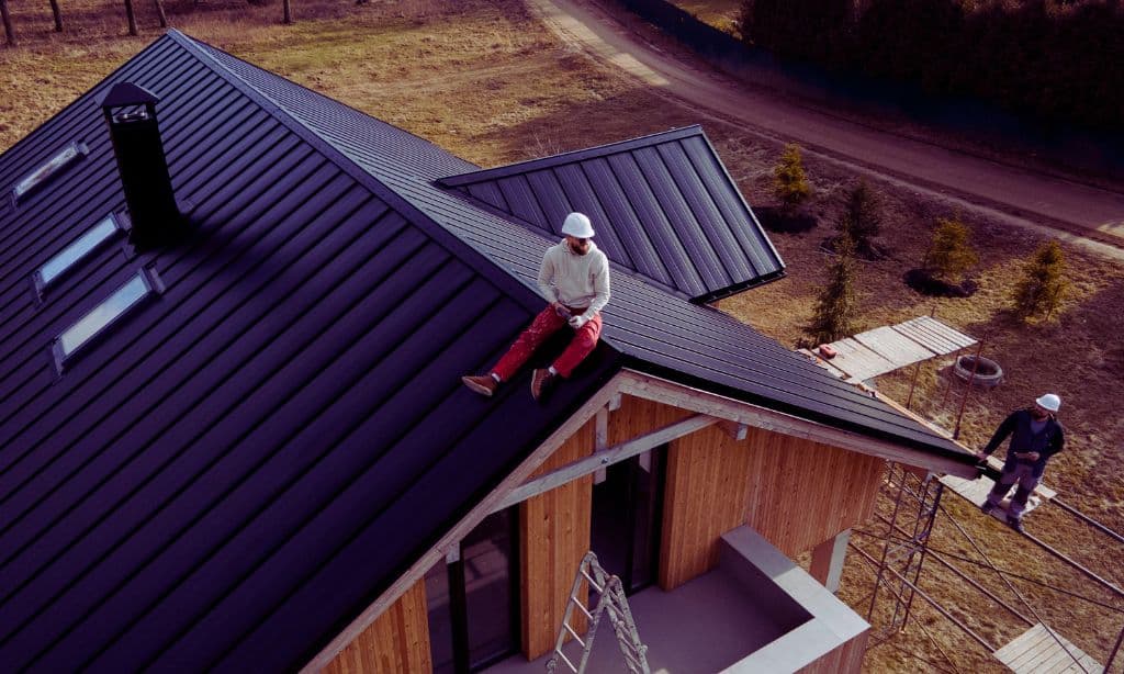 How should roof overhangs be designed for seasonal efficiency