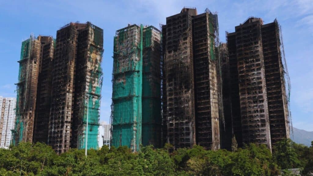 hong kong fire protests beijing warning